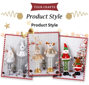 Detailed view of telescopic Christmas plush dolls in festive silver, gold, and red tones