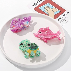 Set of 3 acetate ocean animal hair claws with whale, dolphin, and turtle marble patterns