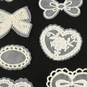 Ivory white lace embroidery patches set featuring bow and floral patterns for DIY crafts