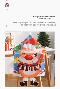 Detailed view of a Christmas chair cover with a cartoon reindeer design and JOY print