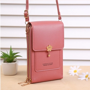 Pink PU leather crossbody phone bag with gold petal charm and dual zipper compartments
