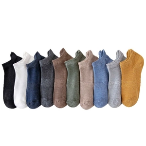 Set of 10 pairs of solid color low-cut cotton socks in diverse neutral and vibrant tones