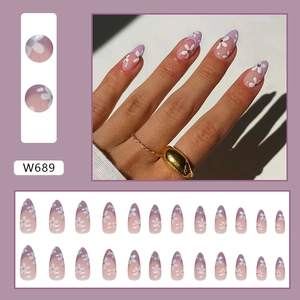 Almond shaped taro purple French press-on nails with white flower designs and 24pc set