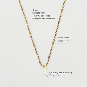 Detail of 18K gold-plated stainless steel lightning bolt pendant with mirror polishing