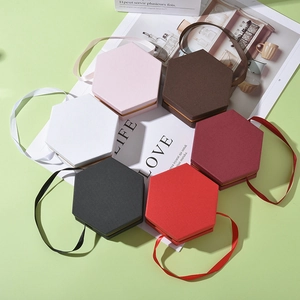 Hexagonal jewelry gift boxes with silk ribbon handles in multiple colors for rings