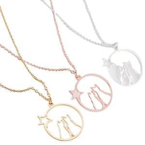 Cat couple star moon necklaces in gold, rose gold and silver finishes on white background