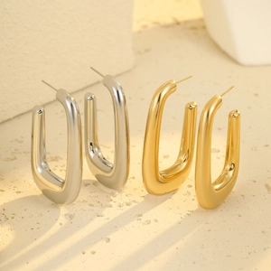 Exaggerated minimalist hollow U-shape stainless steel earrings in gold and silver finish