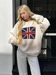 Loose white knitted sweater with vintage British flag pattern and ribbed round neck