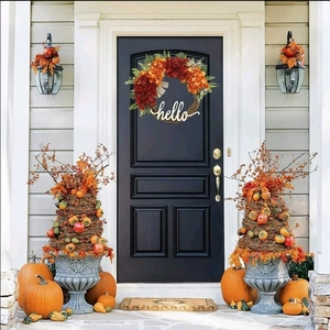 Fall hydrangea wreath with wooden hello sign on black door for Thanksgiving decor