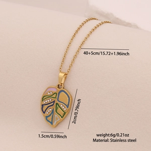 Detail view of colorful enamel leaf pendant with size measurements on stainless steel chain