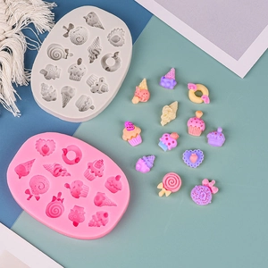 Silicone fruit and dessert lollipop molds in pink and white for DIY chocolate making