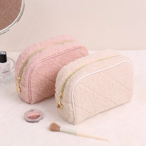 Quilted teddy fleece makeup bag with star charm and golden zipper in cream white