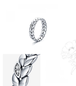 Macro detail of S925 sterling silver ring showing wheat leaf design and hallmark
