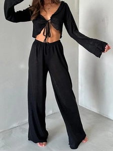 Ensemble noir deux pièces pour femme avec haut court noué et pantalon large