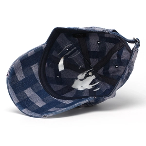 Distressed blue and white plaid denim baseball cap with adjustable metal buckle back