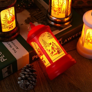 Close-up of vintage red Christmas mailbox LED lantern with warm glowing light