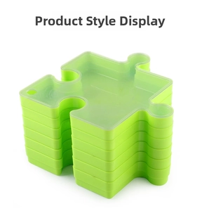 Stackable puzzle-shaped sorting trays in green for 1000 piece puzzles storage