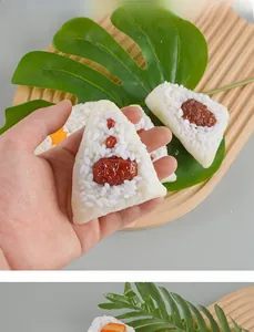 Realistic PVC Zongzi food model with red beans and rice on decorative leaves and wood