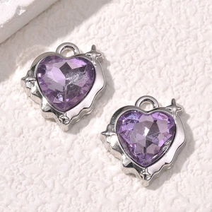Violet heart crystal pendant with silver star frame and faceted purple gemstone charms