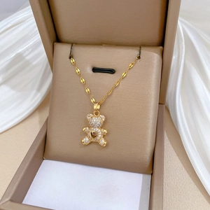 Golden titanium bear necklace with heart zircon pendant in elegant gift box
