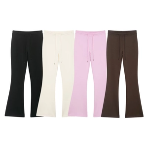 Close-up of women's flare trousers showing drawstring waist and four available colors