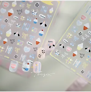 Detail of KX480 cute cartoon dog and cat nail stickers with matte adhesive finish