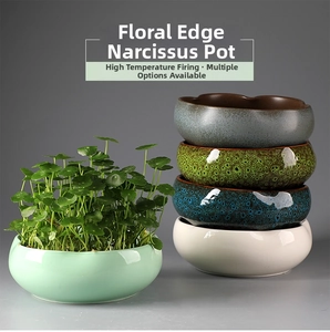 Close-up of wavy edge ceramic hydroponic planters with various glazed finishes