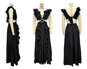 Detail showing deep V-neck, waist cut-outs with ring, and ruffled hem on black dress