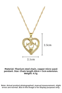 Detail of gold heart pendant necklace featuring a hollow MOM design with inlaid crystals