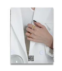 Detail of minimalist S925 silver gold rings with zircon and rectangle stone on hand