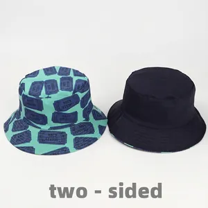 Reversible bucket hat with retro ticket print and solid navy blue cotton canvas style