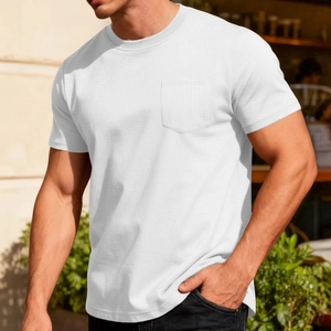 Men's casual white waffle knit t-shirt with chest pocket in an outdoor scene