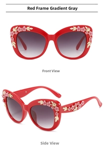 Detailed views of red cat-eye sunglasses with pink floral and golden leaf accents