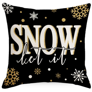 Christmas pillow cover with black fabric, snow typography and gold glitter snowflake pattern