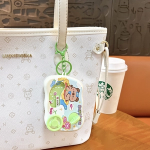Cute Capybara mini game console keychain stress relief toy hanging on white bag