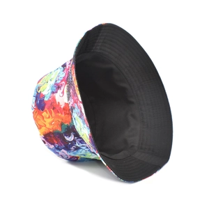 Detail of reversible bucket hat with colorful oil painting print and solid black inner side