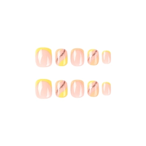 Short yellow French line press-on toenails with gold glitter and multi-color pattern