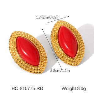 Detailed view of marquise red resin earrings with gold braided texture and size specs