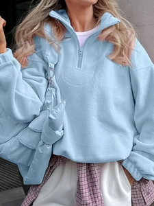 French style light blue fleece half-zip sweatshirt in a relaxed outdoor street fit