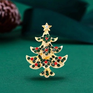 Exquisite Christmas tree brooch with green and red rhinestones on a gold metal base