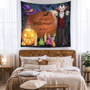 Close-up of Halloween tapestry featuring glowing pumpkins, bats and dark night theme text