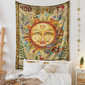 Detail view of bohemian sun tapestry featuring hand-drawn nature art in a bedroom setting