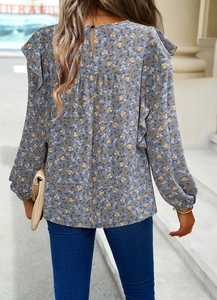 Back detail of floral long sleeve blouse with shoulder ruffles and neck slit design