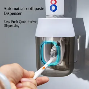 Automatic white toothpaste dispenser wall mounted with mechanical lever for bathroom