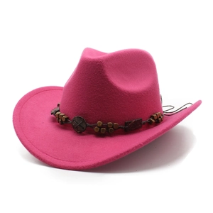 Detail of rose pink wool felt western cowboy hat featuring ethnic wooden beaded band