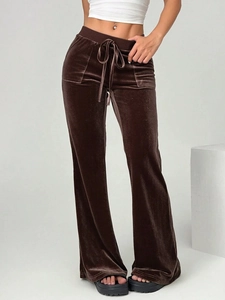 Women's dark brown velvet flare trousers with high waist drawstring and drapey fit