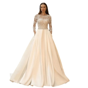 Elegant A-line bridal gown with lace embroidery long sleeves and smooth satin skirt