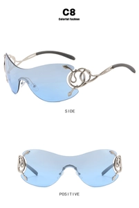 Detail of Y2K rimless sunglasses featuring light blue lenses and silver snake temple design
