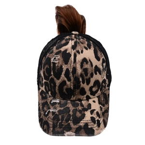 Close-up of leopard print ponytail baseball cap with distressed holes and mesh back