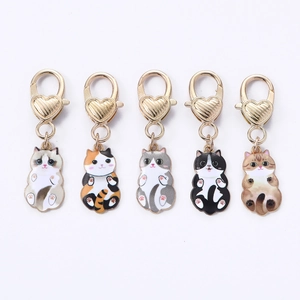 Five-piece set of cartoon cat enamel pendants with golden heart-shaped keychains